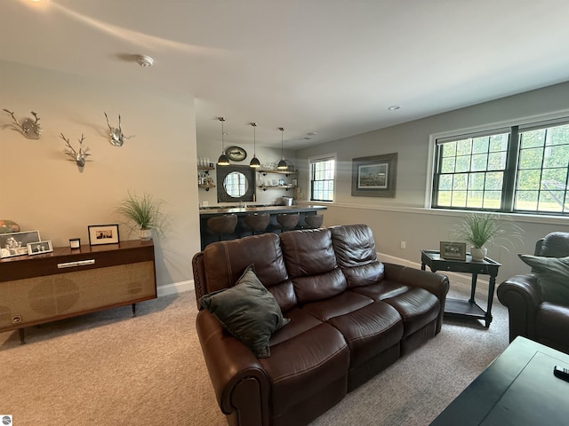 777 Stoneridge Dr, Mount Pleasant, MI 48858 - carpeted living area featuring baseboards