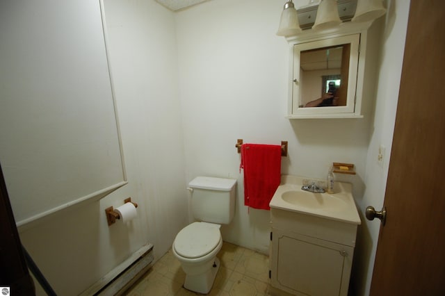 1294 Stoney Ridge Rd, West Branch, MI 48661 - half bath featuring a baseboard radiator and vanity