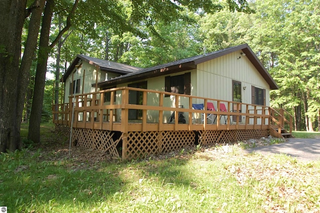 1294 Stoney Ridge Rd, West Branch, MI 48661 - back of property featuring a wooden deck