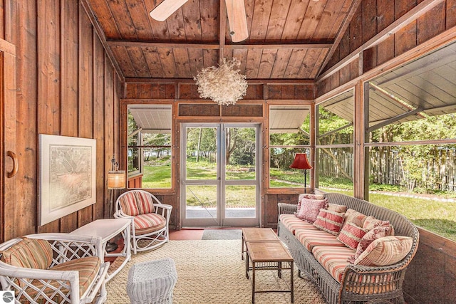 7822 W Welch Rd, Empire, MI 49630 - sunroom featuring french doors, vaulted ceiling, ceiling fan, and an outdoor hangout area