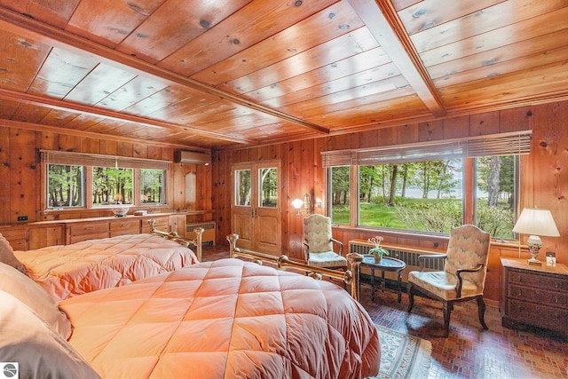 7822 W Welch Rd, Empire, MI 49630 - bedroom with wooden ceiling, wooden walls, radiator heating unit, a wall mounted air conditioner, and hardwood / wood-style flooring