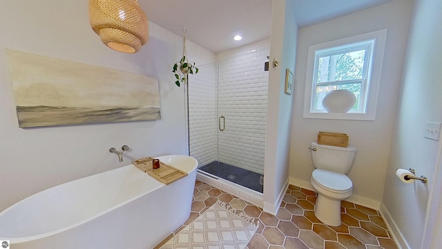 84 9 Mile Rd NW, Comstock Park, MI 49321 - full bathroom with a freestanding tub, a stall shower, tile patterned flooring, and recessed lighting