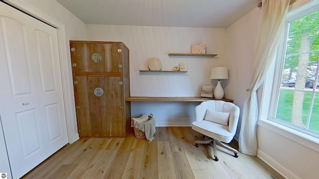84 9 Mile Rd NW, Comstock Park, MI 49321 - sitting room with light wood finished floors and baseboards