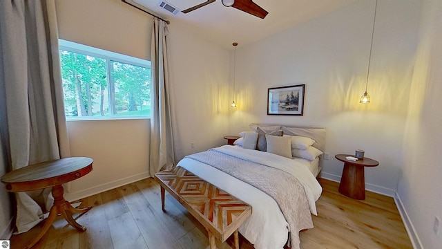 84 9 Mile Rd NW, Comstock Park, MI 49321 - bedroom with light wood-style flooring, ceiling fan, and high vaulted ceiling