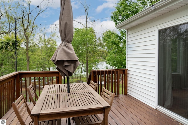 84 9 Mile Rd NW, Comstock Park, MI 49321 - deck with outdoor dining area