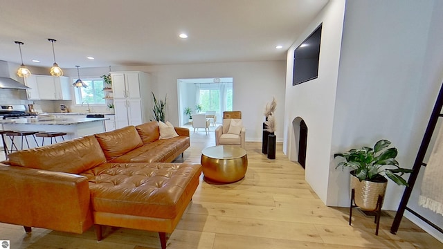 84 9 Mile Rd NW, Comstock Park, MI 49321 - living room featuring light wood finished floors, recessed lighting, and healthy amount of natural light