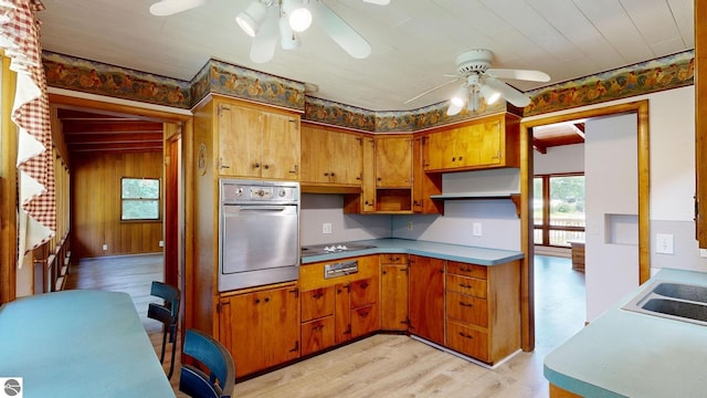 1519 Ridge Rdg, Mount Pleasant, MI 48858 - kitchen featuring stainless steel oven, ceiling fan, plenty of natural light, and black electric stovetop