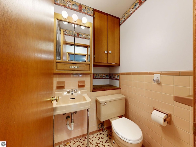1519 Ridge Rdg, Mount Pleasant, MI 48858 - half bathroom with tile walls and a wainscoted wall