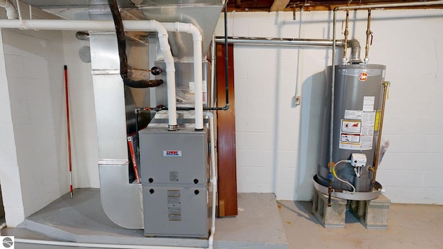 1519 Ridge Rdg, Mount Pleasant, MI 48858 - utility room featuring gas water heater and heating unit