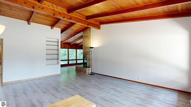 1519 Ridge Rdg, Mount Pleasant, MI 48858 - spare room with wood ceiling, wood finished floors, and a fireplace