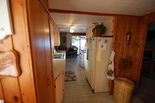 4038 Ogemaw Shores Dr, West Branch, MI 48661 - corridor featuring light wood-style floors and wooden walls