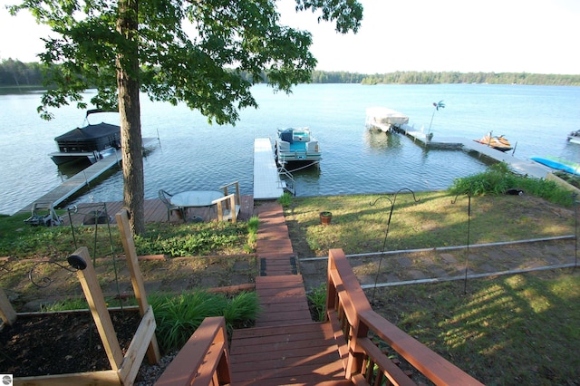 4038 Ogemaw Shores Dr, West Branch, MI 48661 - dock with a water view and boat lift