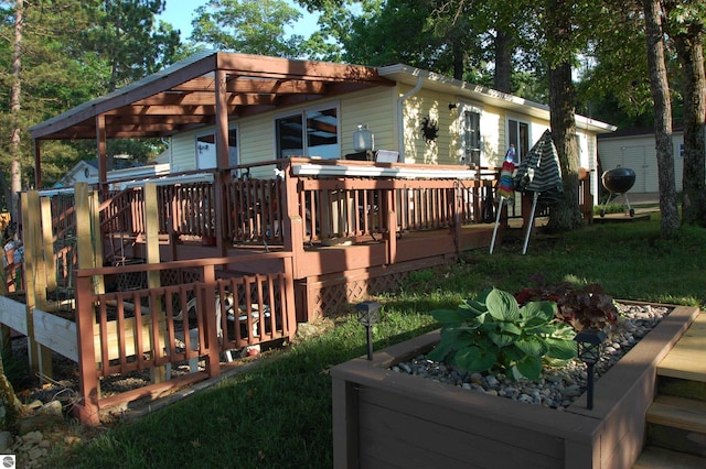 4038 Ogemaw Shores Dr, West Branch, MI 48661 - back of house featuring a wooden deck