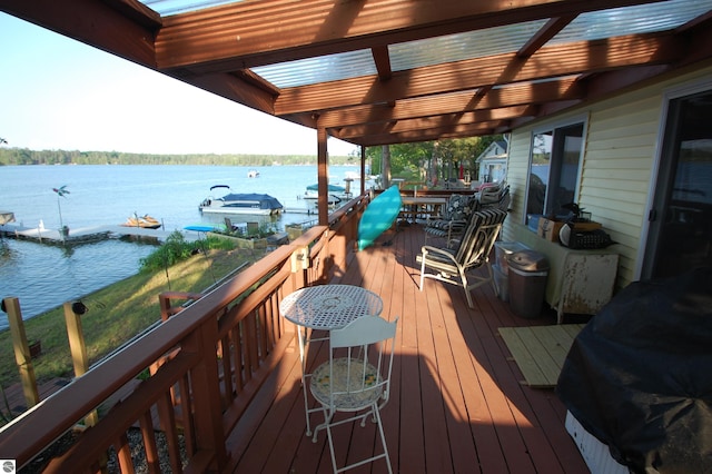 4038 Ogemaw Shores Dr, West Branch, MI 48661 - deck with a water view and area for grilling