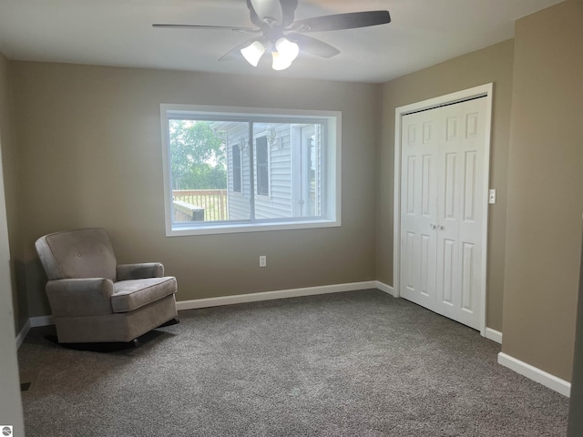 2507 N Lincoln Rd, Rosebush, MI 48878 - living area with carpet flooring and ceiling fan