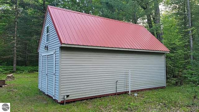 1947 NE Anita Rd, Kalkaska, MI 49646 - view of outbuilding with a forest view
