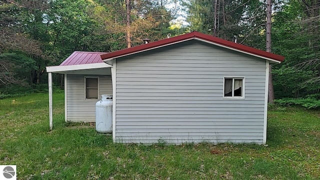 1947 NE Anita Rd, Kalkaska, MI 49646 - view of outdoor structure with a view of trees