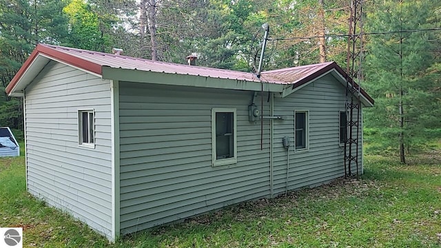 1947 NE Anita Rd, Kalkaska, MI 49646 - view of outdoor structure featuring a view of trees