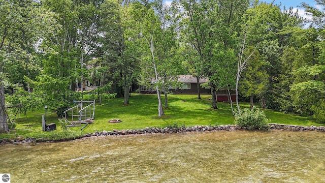 7786 N Shore Ct, Grawn, MI 49637 - view of green lawn