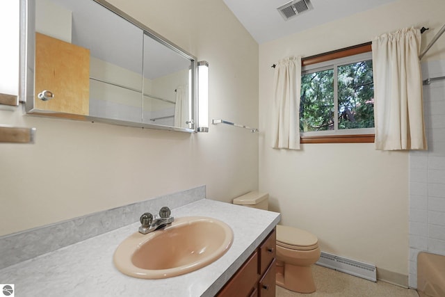7786 N Shore Ct, Grawn, MI 49637 - full bath with a baseboard radiator, vanity, and a shower