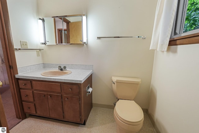 7786 N Shore Ct, Grawn, MI 49637 - half bathroom with vanity and toilet
