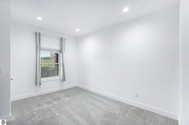 23736 110th Ave, Tustin, MI 49688 - carpeted empty room featuring recessed lighting and baseboards