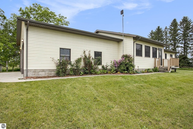 1520 Kuehn Rd, Sterling, MI 48659 - view of property exterior featuring a lawn