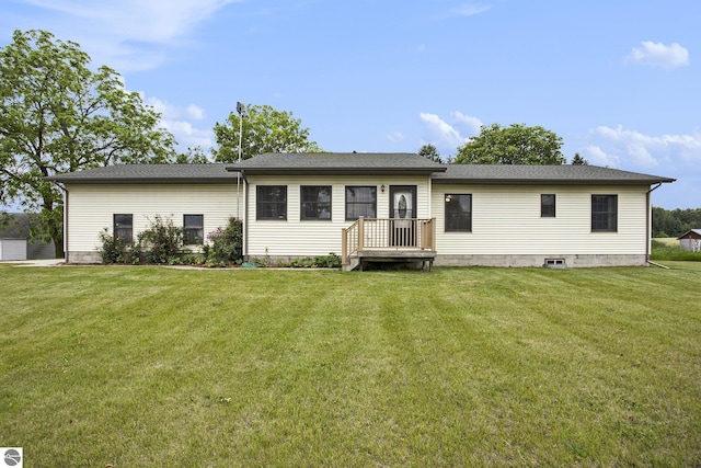 1520 Kuehn Rd, Sterling, MI 48659 - back of property featuring a yard