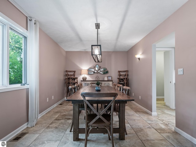 398 High View Rd, Traverse City, MI 49696 - dining room featuring baseboards