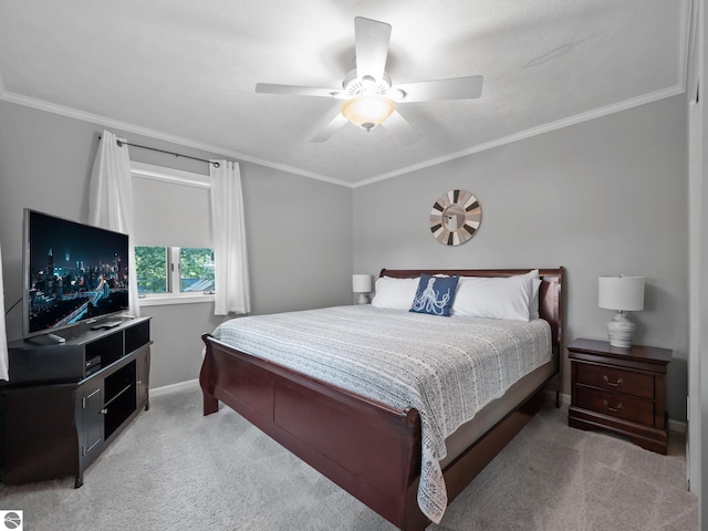398 High View Rd, Traverse City, MI 49696 - bedroom with light carpet, crown molding, and a ceiling fan