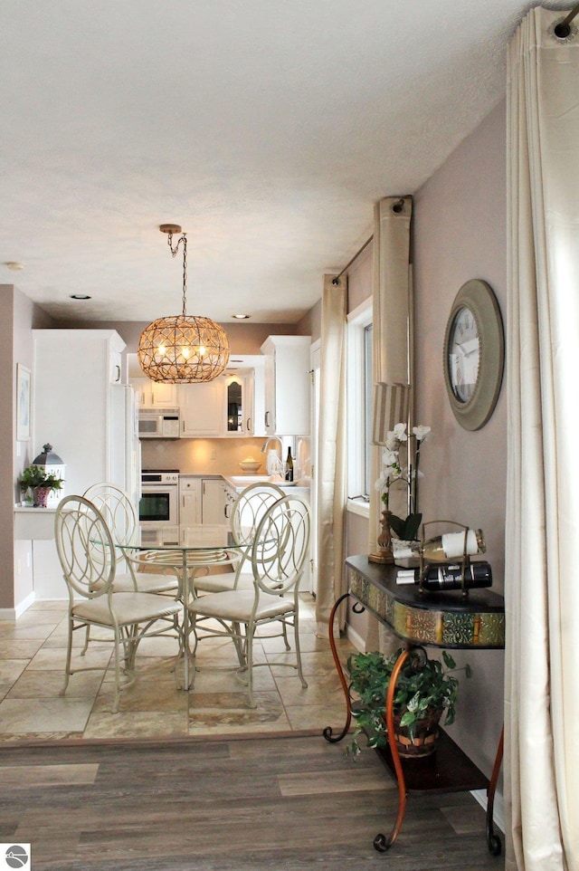 398 High View Rd, Traverse City, MI 49696 - dining space featuring light wood-style floors