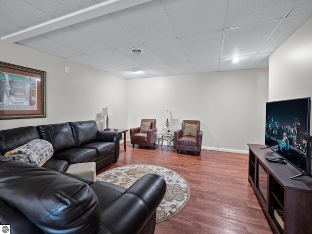 398 High View Rd, Traverse City, MI 49696 - living room featuring a drop ceiling and wood finished floors