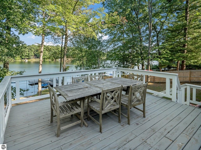 398 High View Rd, Traverse City, MI 49696 - deck featuring a water view and outdoor dining space