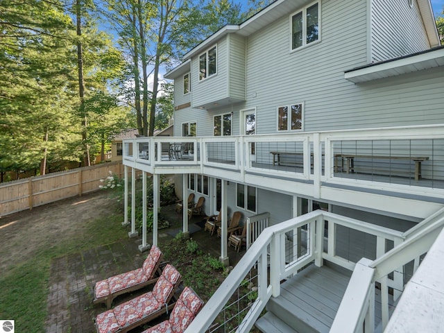 398 High View Rd, Traverse City, MI 49696 - back of house featuring a wooden deck