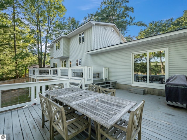 398 High View Rd, Traverse City, MI 49696 - deck featuring area for grilling and outdoor dining space