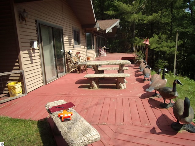 60 Sheer Rd, East Tawas, MI 48730 - deck featuring outdoor dining space