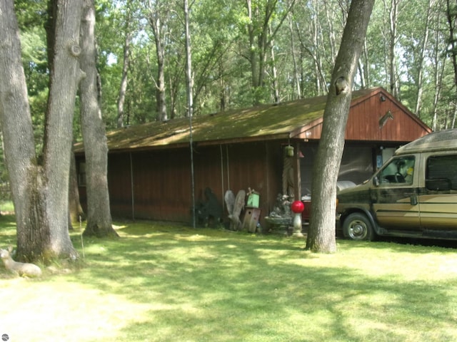 60 Sheer Rd, East Tawas, MI 48730 - view of pole building with a carport and a lawn