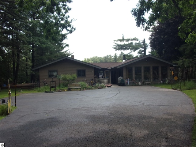 60 Sheer Rd, East Tawas, MI 48730 - view of front of house featuring asphalt driveway