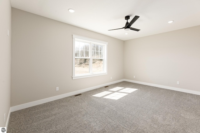 1572 Oban Way, Traverse City, MI 49696 - carpeted spare room with recessed lighting and a ceiling fan
