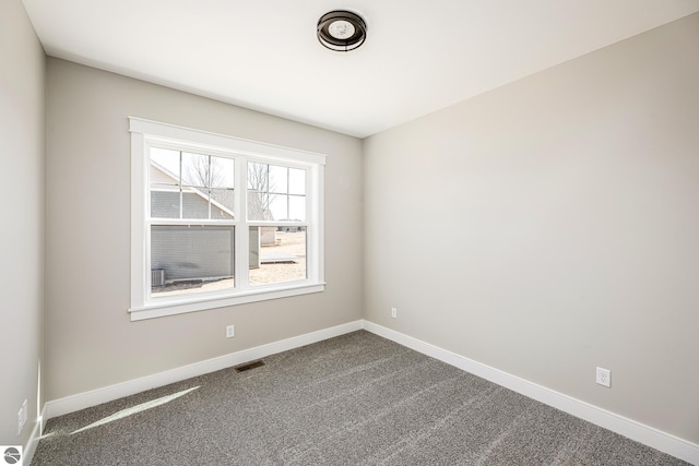 1572 Oban Way, Traverse City, MI 49696 - empty room with dark carpet