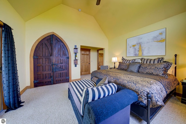 10702 E Hill Top Rd, Suttons Bay, MI 49682 - carpeted bedroom with vaulted ceiling and ceiling fan