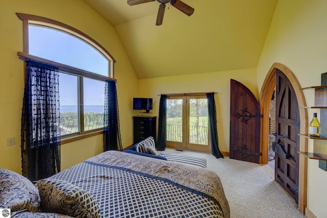 10702 E Hill Top Rd, Suttons Bay, MI 49682 - carpeted bedroom with vaulted ceiling, access to exterior, and a ceiling fan