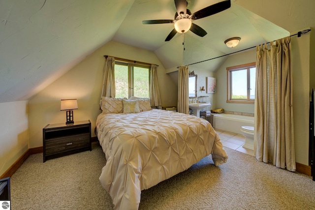 10702 E Hill Top Rd, Suttons Bay, MI 49682 - carpeted bedroom with vaulted ceiling and a ceiling fan