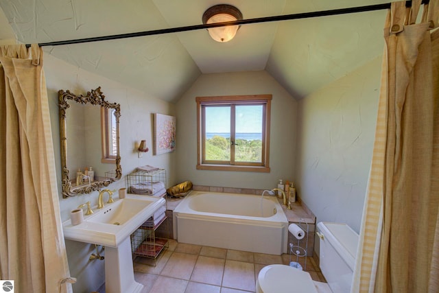 10702 E Hill Top Rd, Suttons Bay, MI 49682 - bathroom with a garden tub, tile patterned floors, and vaulted ceiling