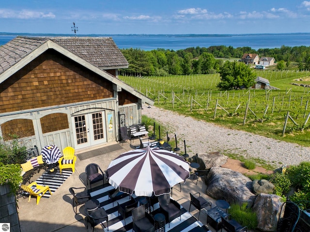 10702 E Hill Top Rd, Suttons Bay, MI 49682 - view of patio featuring french doors