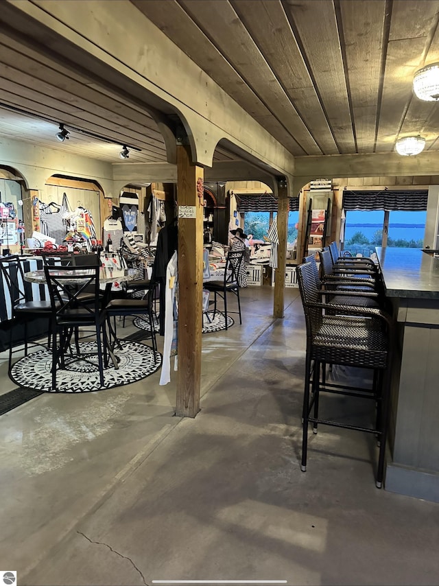 10702 E Hill Top Rd, Suttons Bay, MI 49682 - dining room with finished concrete flooring