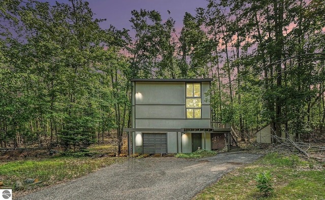 6740 Pheasant Run, Gaylord, MI 49735 - view of front of property featuring stairway and driveway