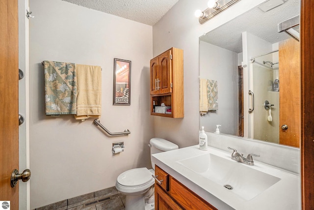 6740 Pheasant Run, Gaylord, MI 49735 - bathroom featuring a textured ceiling, vanity, and a shower