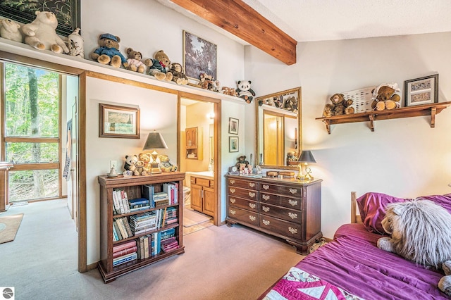 6740 Pheasant Run, Gaylord, MI 49735 - bedroom featuring light carpet, beamed ceiling, and connected bathroom