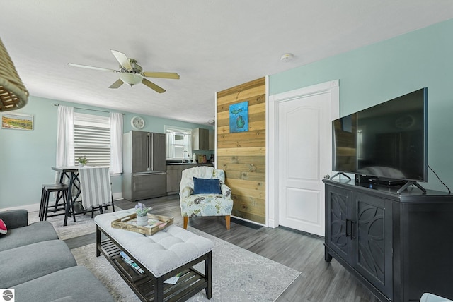 1029 E Front St, Traverse City, MI 49686 - living area featuring wood finished floors and a ceiling fan